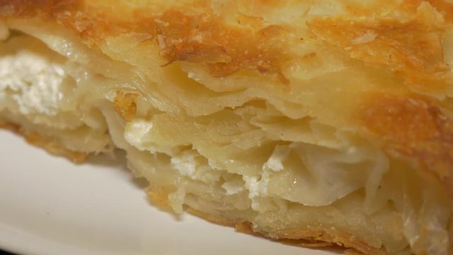 Burek fast food made in Serbia 4K 2160p UHD video - Burek traditional breakfast meal in Serbia 4K 3840X2160 UHD footage