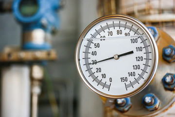 Pressure gauge in oil and gas production process for monitor condition, The gauge for measure in industry job, Industry background and close up gauge , gauge for measure pressure in the process.
