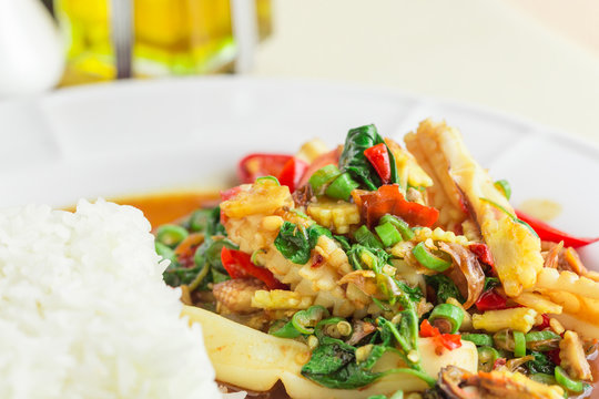Thai food : Rice with stir-fried seafood and basil.