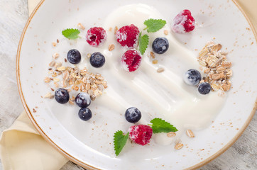 Breakfast of yogurt and berries. Healthy eating, dieting concept