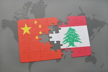 puzzle with the national flag of china and lebanon on a world map background.