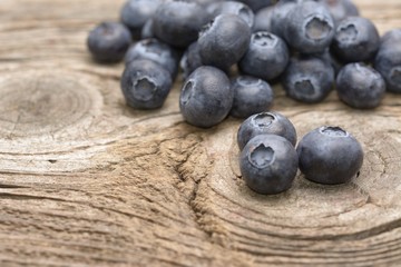 blueberries close up on a wood table