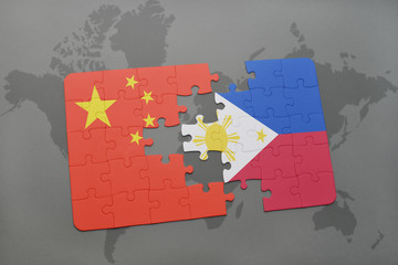 puzzle with the national flag of china and philippines on a world map background.