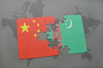 puzzle with the national flag of china and turkmenistan on a world map background.