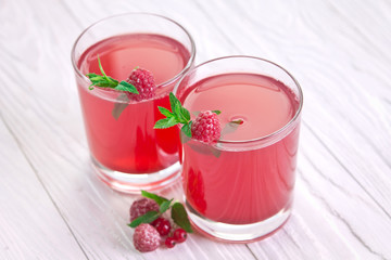 Refreshing raspberry drink with mint