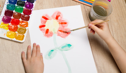 Children painted watercolor flower