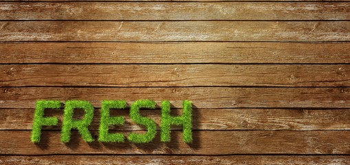 fresh made of grass on wood background
