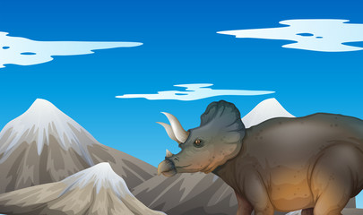 Scene with dinosaur and mountains