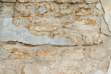 Obraz na płótnie Canvas Brick texture with scratches and cracks