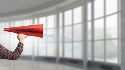 Man shouting in pape cone . Mixed media