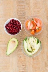 Tomato and avocado slices with pomegranate