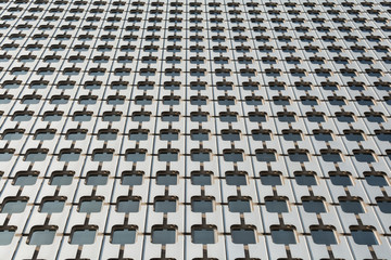 Pattern of the facade of a modern office building from steel and glass