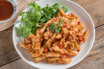 Squid fried in plate. Top view.
