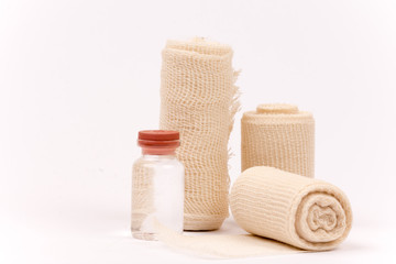 Bandage rolls and injection syringe bottle