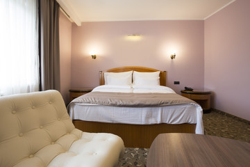 Fototapeta na wymiar Classic style hotel bedroom interior