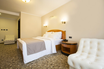 Fototapeta na wymiar Classic style hotel bedroom interior