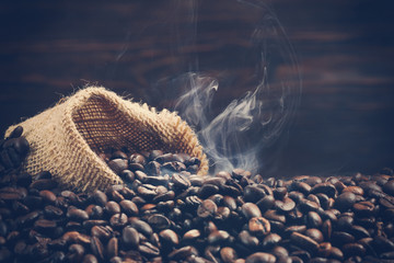 Vintage photo of roasting coffee beans with smoke