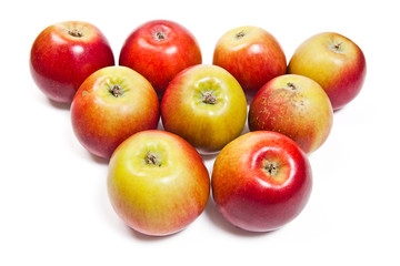 Group of ripe apples on a white background
