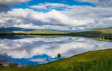 The perfect reflection of the sky in the lake