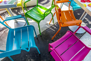 colorful chairs at an outdoor restaurant in Miami