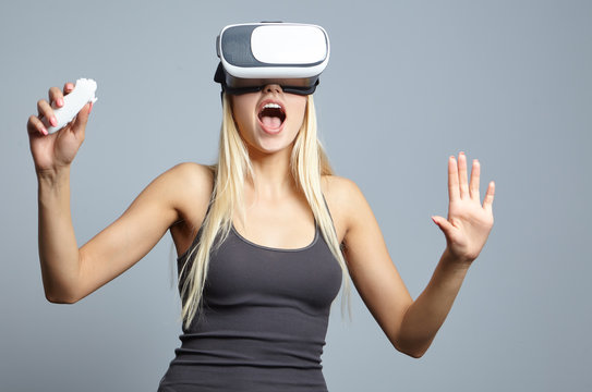 Smile happy woman getting experience using VR-headset glasses of