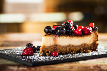 Cheesecake with berries - obrazy, fototapety, plakaty
