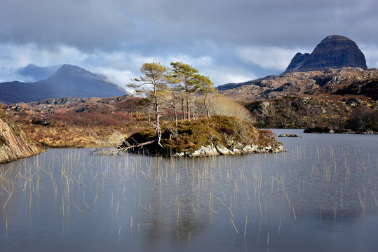 Two mountains of Silvan and Canisp from Loch Druim Suardalain, Sutherland, Scotland