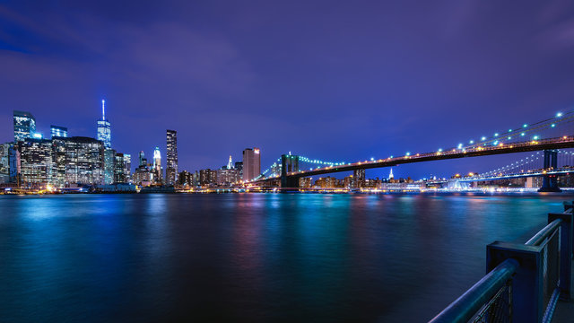 Brooklyn Bridge and Manhattan skyline at dusk, New York City, New York