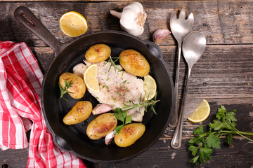 fish fillet and baked potato