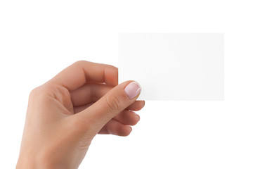 Obraz premium Business card in female hand isolated at white background.