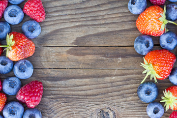 close-up of berries on a wooden background