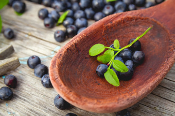 Fresh blueberries on wooden table. Blueberry antioxidant. Concept for healthy eating