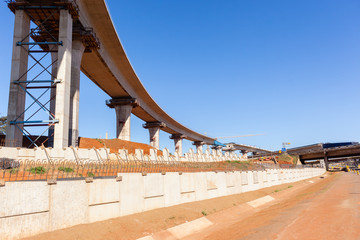 Construction Highway intersection junction flyover ramps structures for traffic flow.