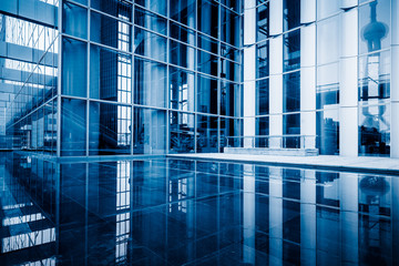 Plakat office building interior,blue toned image.