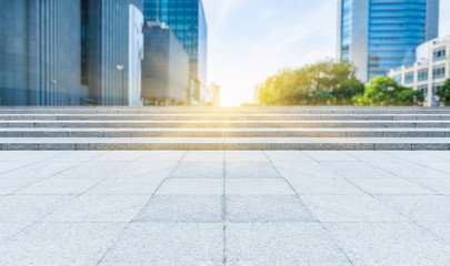 empty pavement front of modern architecture