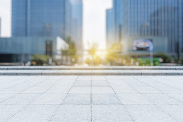 empty pavement front of modern architecture
