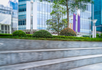 empty pavement front of modern architecture