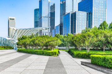 empty pavement front of modern architecture
