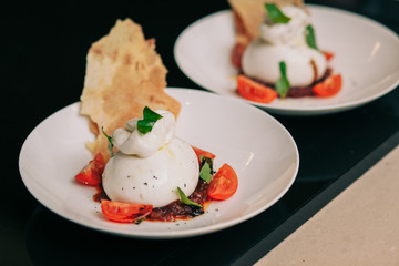 Burrata mozzarella with tomato tartare