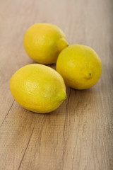 Lemons on a wooden background