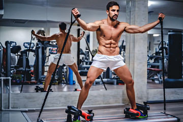Fototapeta premium Man trains on slider
