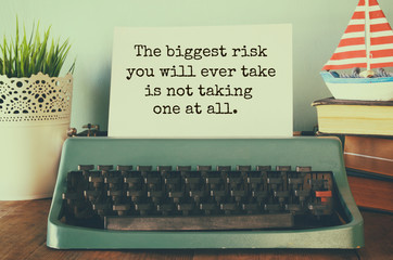 vintage typewriter and paper with the printed text