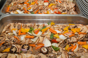 Roast pork slice with gravy sauce and fruit on top