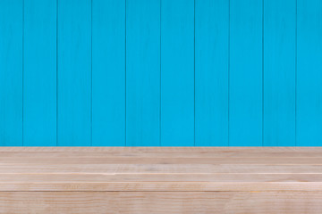 Wood table top on blue wood background