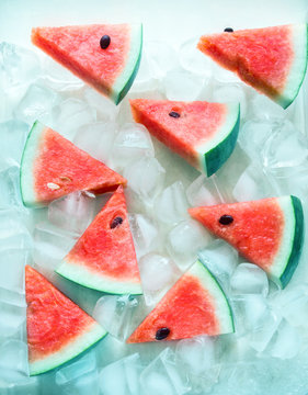 fresh sliced watermelon fruit on cool ice cube  , top above view