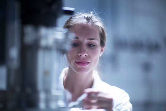 Scientist working with SEM microscope