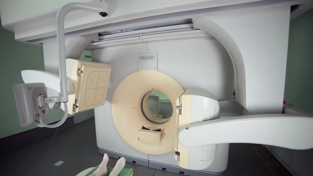 Tomograph. Patient on magnetic resonance medical examination. 1080p