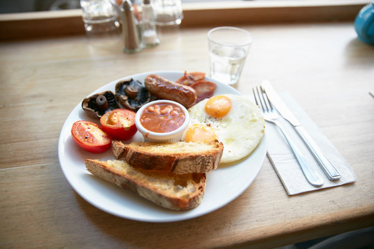 Full English Breakfast On Counter In Cafe