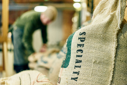 Close up of speciality coffee bean sack in store room