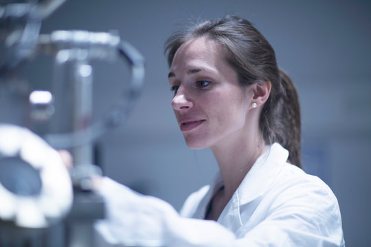 Scientist working with SEM microscope